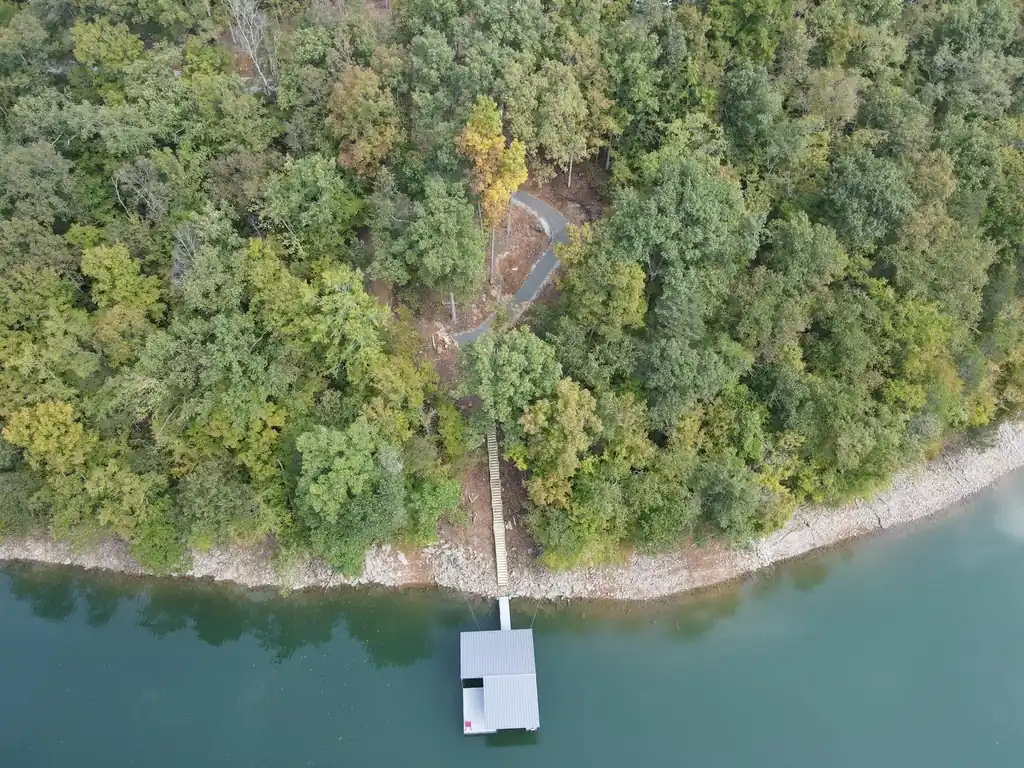 Aerial view of the lakefront property and dock served by that concrete driveway near Knoxville, Tennessee