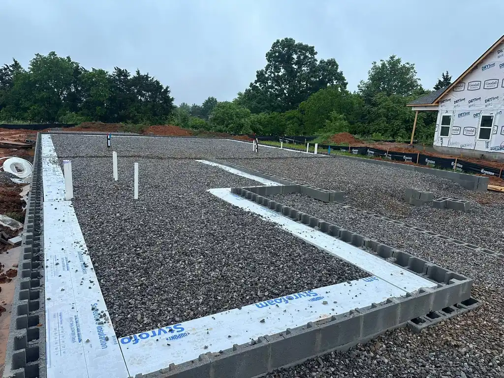 Block foundation walls and gravel fill ready for a slab in Knoxville, Tennessee