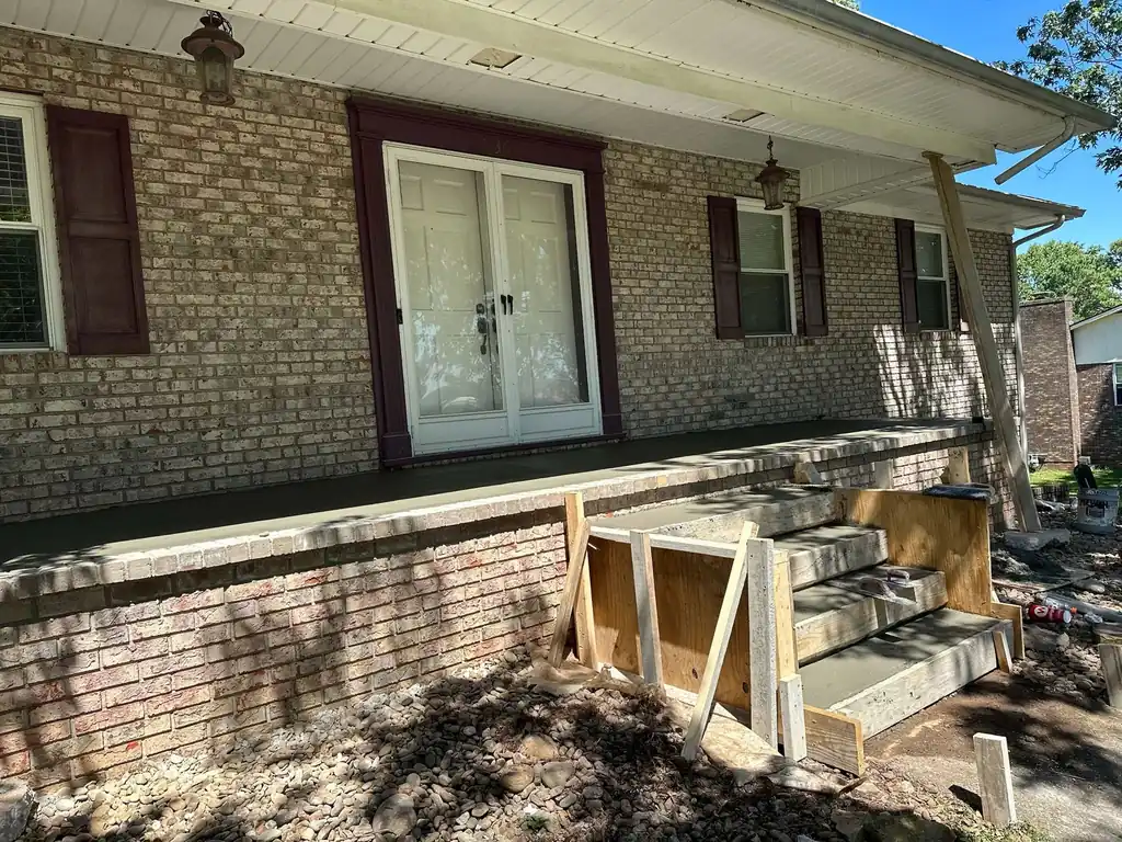 Forms built for new concrete steps at a brick home in Knoxville, Tennessee